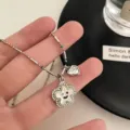 Graziosa collana con ciondolo a stella e perline colorate dal dolce design sorridente per donne. - Collana di Fiori