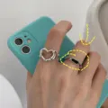 Set anelli aperti cuore argento e rettangolo nero, stile minimalista chic alla moda. - Stile Smalto Minimalista
