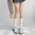 Chaussettes slouch blanches pour femmes, chaussettes mi-mollet en coton pour le quotidien. - Blanc