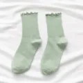 Light green ruffle trim mid-calf socks for women, cozy solid color ribbed knit long socks. - One Size Bare Socks / Green