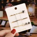 Ensemble d'épingles à cheveux dorées avec étoiles en émail noir et blanc, perles et strass. - Étoile Noir Gris / Pack de 3