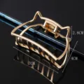 Detailed view of the gold cat ear metal hair claw clip, showing dimensions and alloy design. - Cat Ears Shape / 7cm / Gold
