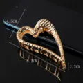 Elegant metal hair claw clip for women, large heart-shaped geometric design for daily styling. - Heart-shaped Hollow Hammered Texture Design / 8.2cm / Gold