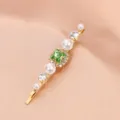 Elegant gold hairpin featuring a sparkling green crystal, faux pearls, and clear rhinestones. - Rhinestone Pearl Barrette (S34) / Fruit Green
