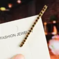 Rhinestone hair clip detail view, gold metal bobby pin with amber crystals on card display. - Straight Hair Clip (1#) / Silver Dark Rhinestone