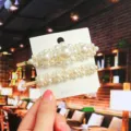 Pearl hair clip detail shot, showing the exquisite clustered pearl design on card display. - 2-Piece Set C