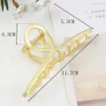 Detail view of the stylish gold metal hair claw clip showing precise product dimensions. - Geometric Hollow Style (S157-13) / 11.7cm / Gold