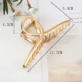Large gold metal hair claw clip for women, elegant hollow geometric design for styling. - Hollow Geometric Style (S157-14) / 11.7cm