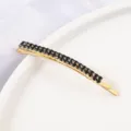 Gold hairpin with double rows of black rhinestones, elegant hair accessory for women. - Curved Hair Clip / Gold Black Gem