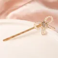 Élégante épingle à cheveux dorée avec nœud en perles et strass pour un style quotidien chic. - S95-10# Barrettes nœud