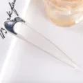 Modern minimalist U-shaped hairpin, metal and acetate hair stick accessory for women. Detail shot. - 10.9cm / Gray
