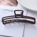 Matte brown metal hair claw clip, minimalist geometric hollow design for daily styling details. - Long Arch Hollow Style (105#)