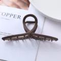 Brown matte geometric hair claw clip detail shot, perfect for secure daily ponytails and buns. - Geometric Cross Ring Style (108#)