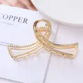 Gold metal hair claw clip for women, elegant geometric ponytail holder hairpin daily accessory. - 30# Gold Twisted Hollow Style / Individual Packaging / 10.7cm