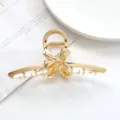 Gold metal hair claw clip with bow design, elegant hair accessory for daily styling and ponytails. - Bowknot Hollow Style (22#) / 11.5cm / Gold