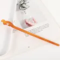 Amber acetate hair stick detail view, featuring minimalist hollow design, elegant hair accessory. - Coffee