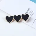 Detail view of Korean style black and white triple heart acrylic hair clip, simple fashion. - Triple Heart Style (28#)