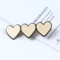 Detail view of Korean style three heart acrylic hair clip, stylish black and beige design. - Triple Heart Style (27#)