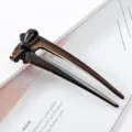 Acetate U-shaped hair fork with hollow bow design, elegant brown hair pin for stylish updo. - Bowknot Hair Fork / Coffee