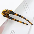 Close up detail of tortoiseshell acetate U shaped flower hair fork for stylish updo hairstyles. - U-Shaped Flower Hair Fork / Tortoise