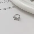 Silver zircon butterfly ear cuff, elegant clip-on earring for women, niche design. - Zirconia Butterfly Clip-On Earring (Single Piece)