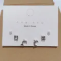 Silver-tone 6-piece earring set featuring pearls, square crystals, and cute dolphin studs. - Dolphin