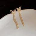 Gold butterfly tassel earrings, elegant rhinestone drop earrings for women daily wear. - Hollow Butterfly Zirconia Tassel Earrings