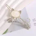Gold rhinestone cat hair clip detail shot, elegant crystal rhinestone hair accessory style. - Cat Rhinestone Frog Clip / Gold