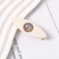 Exquisite resin duckbill hair clip detail showing the sparkling iridescent rhinestone center. - Zirconia Inlaid / Style 1
