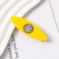 Detailed close-up shot of a vibrant yellow resin hair clip featuring sparkling colorful rhinestones. - Zirconia Inlaid / 2#