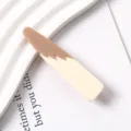 Detailed close-up view of a stylish color-block resin duckbill hair clip in brown and beige. - 15#