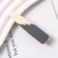 Detailed close-up shot of the two-tone resin duckbill hair clip with smooth texture. - 17#