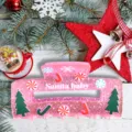 Christmas glitter hair claw clip detail shot, pink festive design with holiday elements. - Pink Glitter Christmas Claw