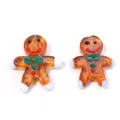 Detailed shot of Christmas gingerbread man glass beads, perfect for DIY jewelry crafting. - Gingerbread Man / 2 Pcs/Set