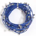 Close-up detail of blue beaded leather cord necklace, punk style multi-layer fashion jewelry. - Cord Width 3mm Stud Outer Diameter 6mm / Sapphire Blue
