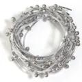 Detailed shot of silver metallic beaded leather cord, punk style DIY clothing jewelry material. - Cord Width 3mm Stud Outer Diameter 6mm / Silver