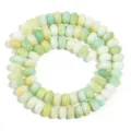 Gros plan de perles d'abaque en verre dégradé coloré, idéal pour la création de bijoux DIY faits main. - Longueur environ 38cm (environ 75 pcs) Taille externe environ 5X8mm Trou environ 1.4mm / Jaune-vert
