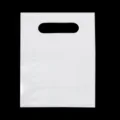 White plastic die cut handle bag detail, durable PE material, clean surface for daily use. - Size Approx 15x20cm / White