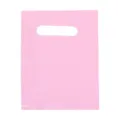 Detail view of the pink plastic die-cut handle bag, showing thick texture and smooth surface. - Size Approx 15x20cm / Pink