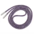 Gros plan d'un cordon strass violet brillant avec embouts metalliques pour vetement. - Diamètre Environ 4mm Longueur Environ 100cm / Violet cristal