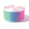 Close-up detail of a vibrant rainbow gradient sheer ribbon roll, perfect for crafts and gifts. - 2.5CM Wide / Rainbow