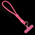Detailed view of the bright pink phone lanyard, showing the adjustable woven strap and tether tab. - 1 Piece / Pink
