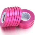 Close-up detail of shiny pink metallic laser balloon ribbons for gift wrapping and party decor. - 5mm Width 10m Length / Rose Red
