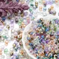 Iridescent glass faceted crystal beads for DIY jewelry making, bracelet and necklace accessories. - 50 Pieces/Pack (8x9mm) / Multicolor