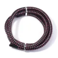 Black braided PU leather cord with red white blue woven threads for DIY jewelry making detail view - 1 Meter / Red Blue White