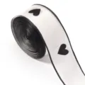 White sheer ribbon with black flocked hearts, perfect for gift wrapping and bows. - 10 Yards/Pack / Heart