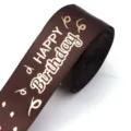 Brown polyester ribbon with gold foil happy birthday print, ideal for gift wrapping and party decor. - Coffee