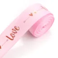 Pink polyester grosgrain ribbon with gold foil love print for gift packaging and DIY bows. - Pink