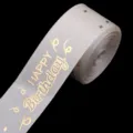 White polyester ribbon with gold foil happy birthday print for party gift box decoration. - Beige