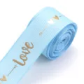 Light blue ribbon detail with gold foil love and heart pattern for DIY gift wrap. - Sky Blue
